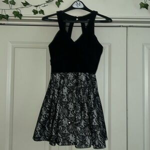 Beautiful short formal dress by Crystal Doll. No stains or tear. Worn once.